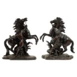 A pair of French bronze sculptures of the Marly Horses, after Guillaume Custou (1677-1746), late