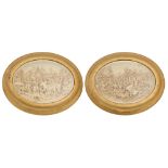 A pair of Continental moulded oval composition reliefs of a battle or other medieval scene, 19th/