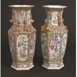 A pair of Chinese hexagonal Canton famille rose vases, 19th c, applied with chilong and lion dogs