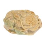 A Chinese jade pebble carving of a toad on a lotus leaf, 95mm l Slight chip to edge of leaf