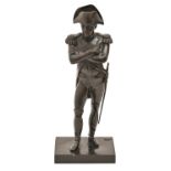 A bronze statuette of Napoleon Bonaparte, cast from a model by Paul Comolera, 20th c, even black