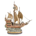 A cold painted Vienna bronze lamp in the form of a 16th century galleon, 20th c, on oval marmo