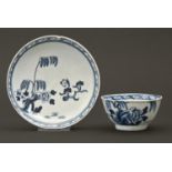 A Liverpool blue and white tea bowl and saucer, Richard Chaffers' Factory, c1760, painted with the