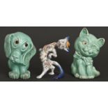 Two Crown Devon green models of a glass eyed cat and dog, 1930's, 24cm h, printed mark and a