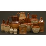 Miscellaneous British saltglazed brown stoneware jugs and other articles, 19th c and later, to