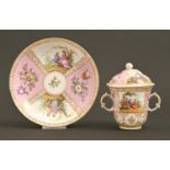 A German porcelain pink ground cabinet cup, cover and matching Meissen saucer, c1900, painted with