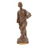 A French orientalist bronze statuette of "Decrotteur Arabe", cast from a model by Edouard Drouot (