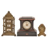A French miniature rouge griotte and nero Belgio marble timepiece, late 19th c, with primrose enamel