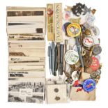 Miscellaneous military cap, society and other badges, pens, pencils and postcards, early 20th c