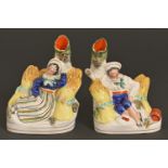 A pair of Staffordshire gleaner figural flatback spill holders, 19th c, painted in bright enamels,