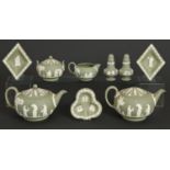 A group of Wedgwood solid green jasper ware articles, to include two teapots and covers, second half
