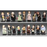 A set of eighteen Royal Doulton bone china figures of Charles Dickens' characters, 9.5-11cm h,