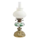 A Victorian stamped brass oil lamp, with white overlay green glass fount, Hink's & Sons patent