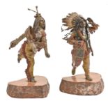 A pair of cold painted Vienna bronze statuettes of a native American chieftain and brave, cast