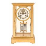 A French gilt brass four glass mantle clock, late 19th c, with enamel dial, Breguet hands and brocot