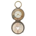 A WWI prismatic compass, S Mordan & Co, No 1697, 1918, 54mm diam, leather case inscribed C C Yeomans