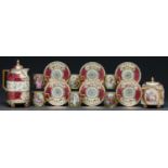 A Continental porcelain coffee service, early 20th c, in Vienna style, printed and painted with
