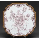 A Dutch Delftware plaque, late 18th c, shaped square with moulded integral frame and painted in