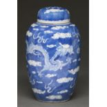 A Chinese blue and white jar and cover, late 19th c, painted with dragons and clouds, 22cm h,