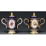 A Royal Crown Derby loving cup and cover, 1980, painted by J McLaughlin, signed, with two oval