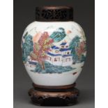 A Chinese famille rose jar, Qing dynasty, 19th c, painted with a landscape and two diminutive