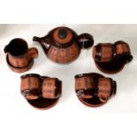 Studio pottery. Gordon Fox (1955 - ) tea service, terracotta and brown glaze, teapot and cover 40.