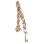 A 9ct gold gate bracelet, padlock and key charm, bracelet 14cm l, 9g Good condition