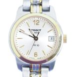 A Tissot bi-metal lady's wristwatch, quartz movement, 24mm diam, maker's bracelet, papers and box