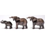 A set of three Beswick elephants, including a calf All good condition