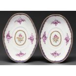 A pair of Worcester oval dessert tureen stands, c1780, painted in polychrome and purple monochrome