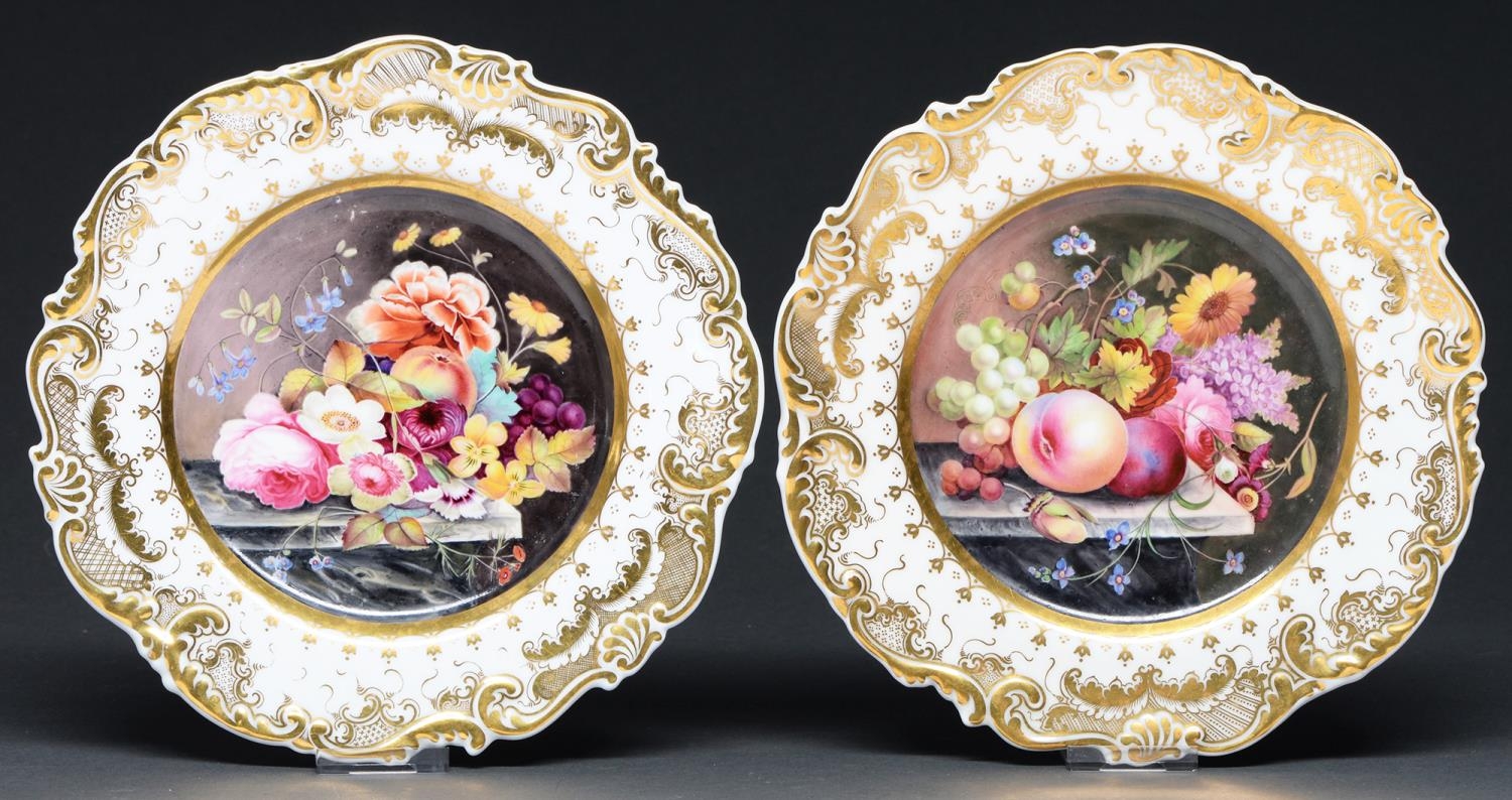 A pair of Chamberlain's Worcester dessert plates, c1830, with moulded scrolling border and painted