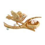 A diamond, turquoise, cultured pearl and 18ct gold bird and nest brooch, 36mm l, London, date letter
