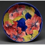 A Moorcroft Hibiscus bowl, late 20th c, 26cm diam, impressed marks, painted initials Good condition
