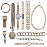 A silver locket and other articles, and several modern fashion wristwatches Mostly in good