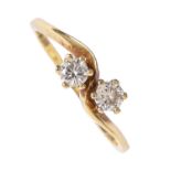 A diamond crossover ring, in 18ct gold, 2.2g, size K Good condition