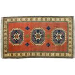 A Persian style wool medallion rug, 20th c, 250 x 164cm Generally good.