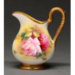 A Royal Worcester jug, 1931, painted with Hadley Roses and gilt, 10.5cm h, blue printed mark