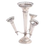 A George V silver flower stand, of one larger and three detachable trumpet shaped vases with pierced