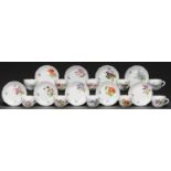 A set of ten Meissen coffee cups and eleven saucers, 20th c, painted with flowers, saucer 10.5cm