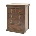 An oak spice cabinet, the five drawers with brass ring pulls, 38cm h; 18 x 31.5cm Wear and scratches