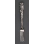 A fine William IV silver fruit fork, London, 1832, the sculptural handle cast and chased with