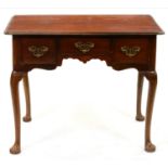 A George III walnut low boy, on cabriole legs and pad feet, 70cm h; 52 x 87cm Handles replaced,