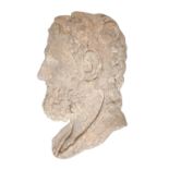 A Grand Tour statuary marble relief of the head of Hercules, 19th c, 47cm h Somewhat weathered and