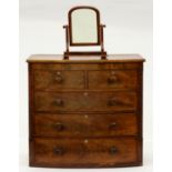 An early Victorian mahogany bow-front chest of drawers, c. 1850, moulded frieze above two short