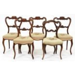 One and a set of four Victorian carved walnut dining chairs Some movement and one or two old