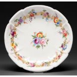 A Nantgarw cruciform dish, c1814-1823, painted with a central group of flowers encircled by