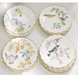 A set of twelve Royal Worcester 'Birds of Dorothy Doughty' dessert plates, 1972-1983, 23cm diam,