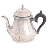A French silver teapot, of 'pleated' baluster shape, 13cm h, by Bucheron Paris, maker's mark and