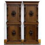 A pair of Victorian oak cabinets, the upper and lower panelled door applied with almost full