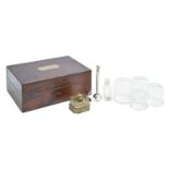 Medical Interest. A cupping set, mid 19th c, comprising twelve bladed brass scarificator with